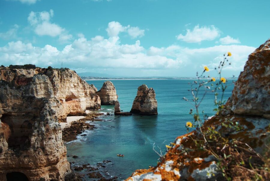 Ponta da Piedade cliffs and turquoise water from boat angle