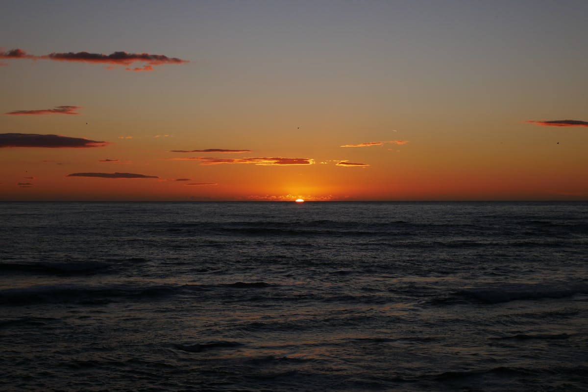 Serene sunset over the Atlantic Ocean as seen from Porto, Portugal