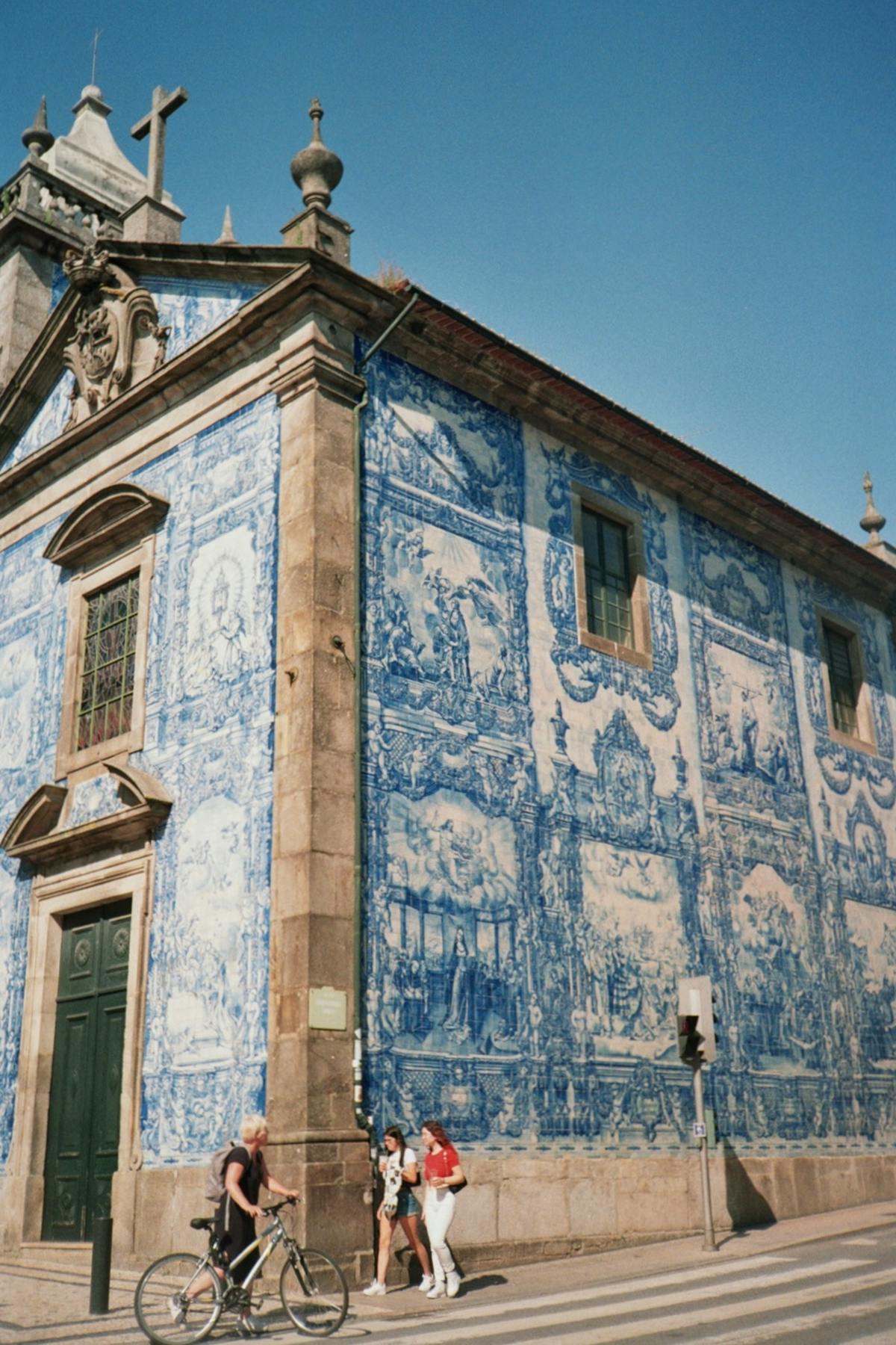 The Chapel of Souls in Porto with its facade covered in blue and white azulejo tiles
