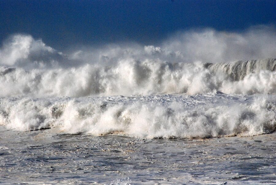 Massive surf waves crashing at Nazare Portugal