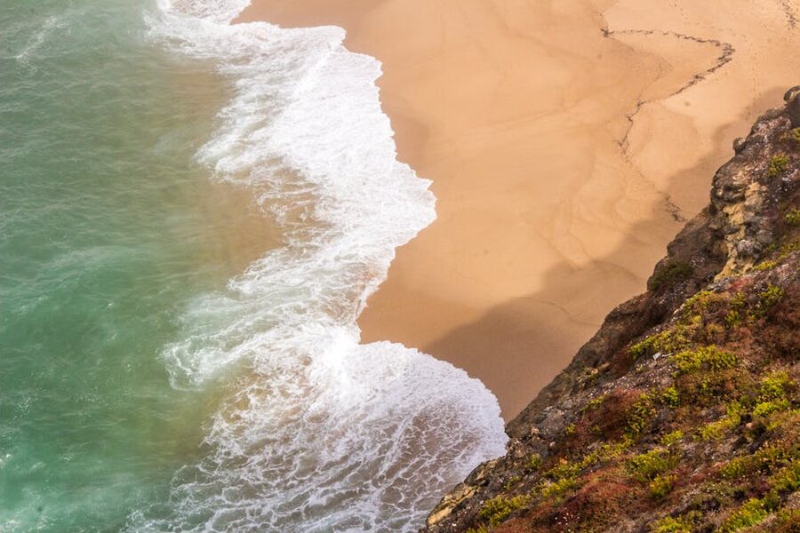 Waves crashing on Nazare beach Portugal