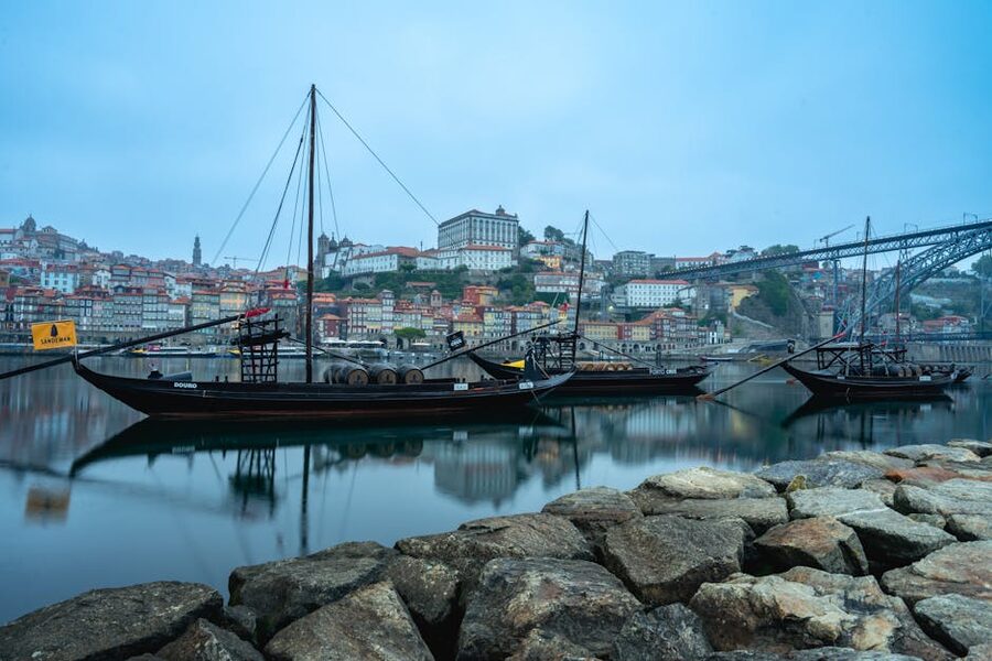 Rabelo boats on the Douro with Porto's waterfront behind