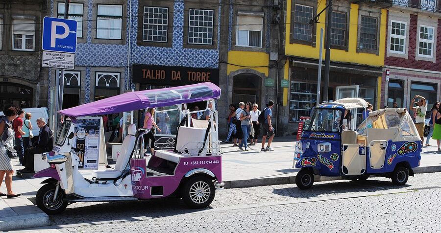 Tuk-tuks lined up in central Porto