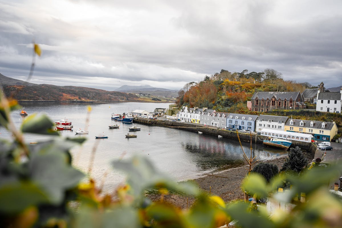 Colorful harbor houses and boats in Portree on the Isle of Skye
