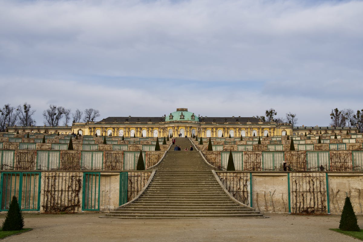 Sanssouci Palace and terraced gardens under blue sky