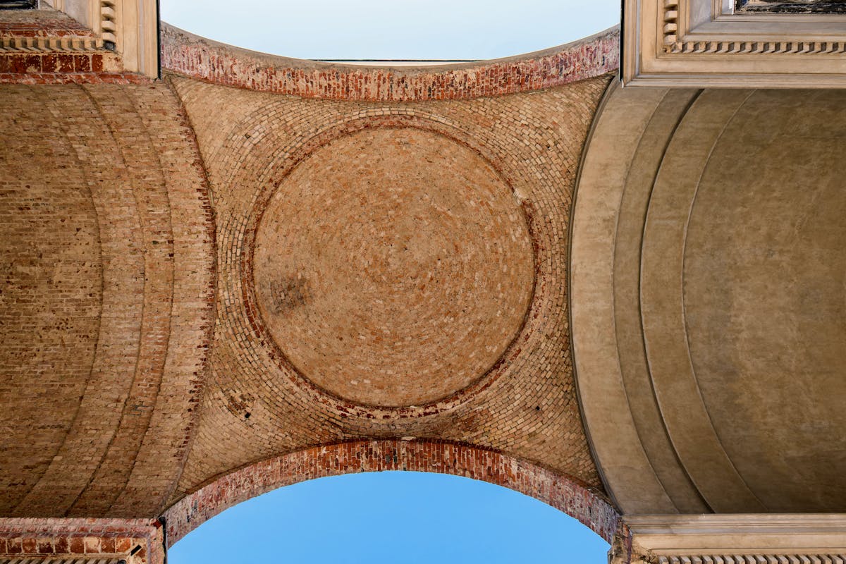 Intricate brickwork and arches inside Sanssouci Palace
