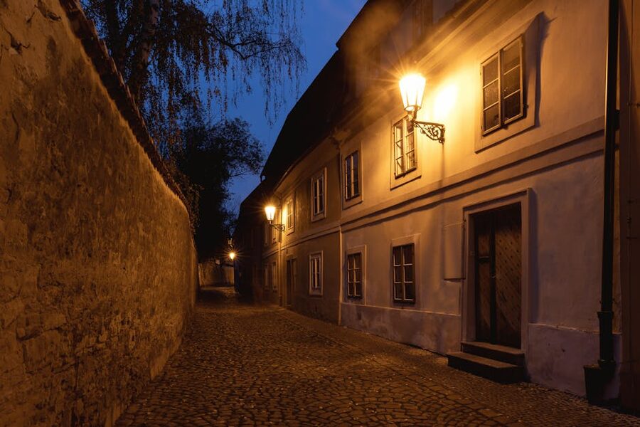 Illuminated Prague cobblestone street