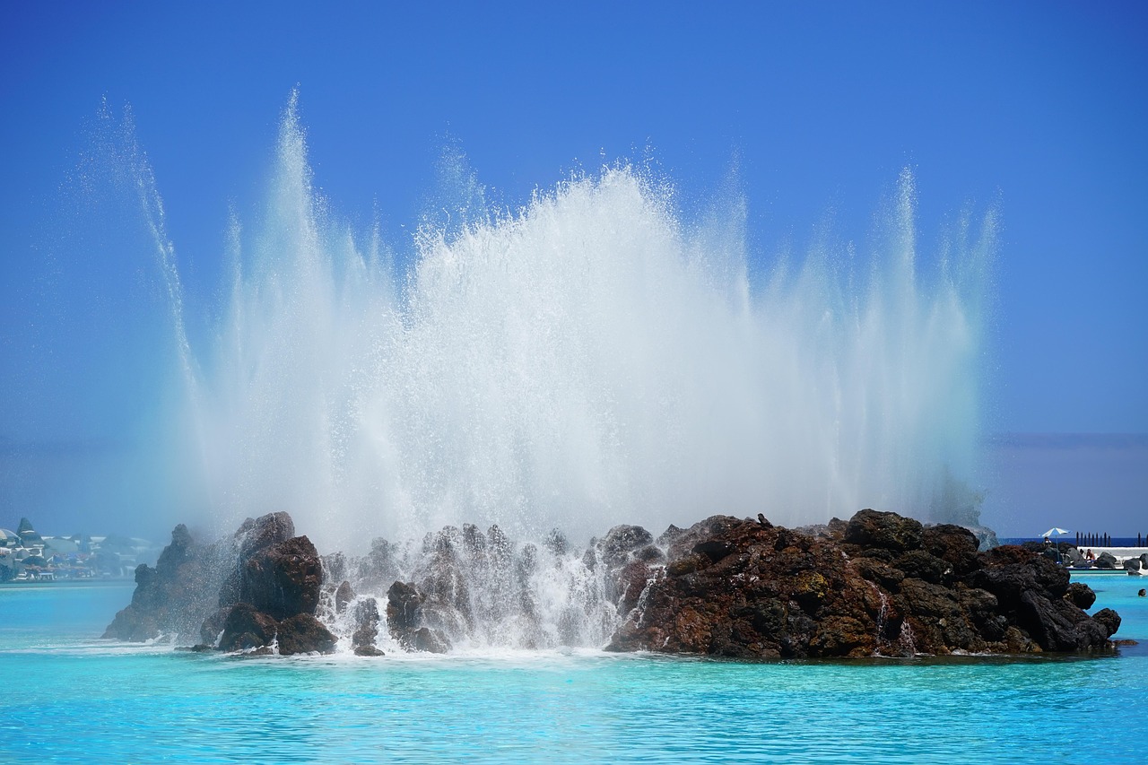 Outdoor swimming pool and fountain at Lago Martianez in Puerto de la Cruz Tenerife