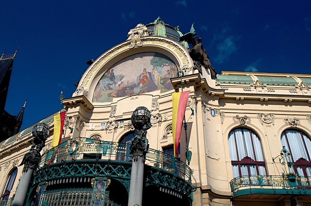 The Art Nouveau facade of the Municipal House in Prague with ornate mosaic detail