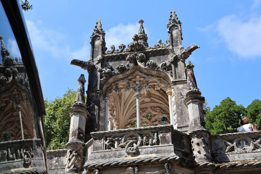 Gothic stone facade detail at Quinta da Regaleira
