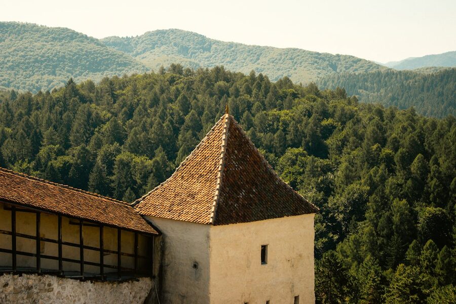 Medieval fortress tower in Transylvania surrounded by forests