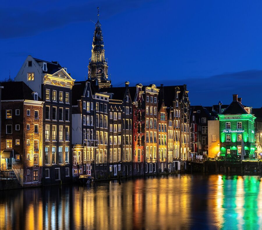 Canal houses Oude Kerk blue hour Amsterdam