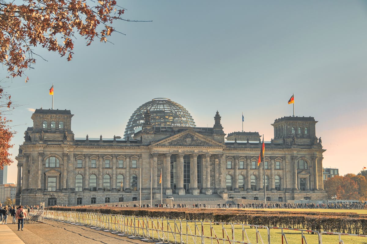The Reichstag building with autumn foliage in the foreground