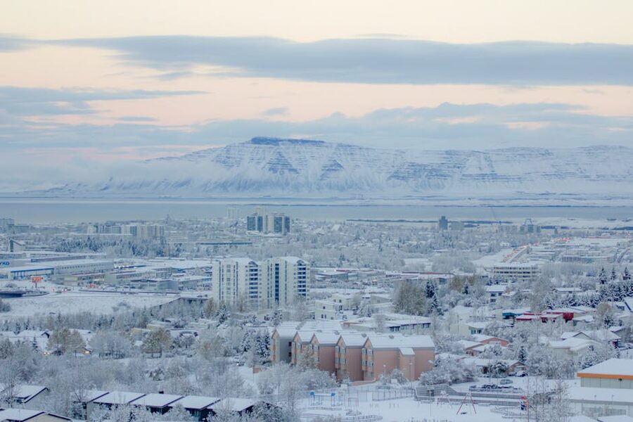 Aerial snowy Reykjavik skyline winter