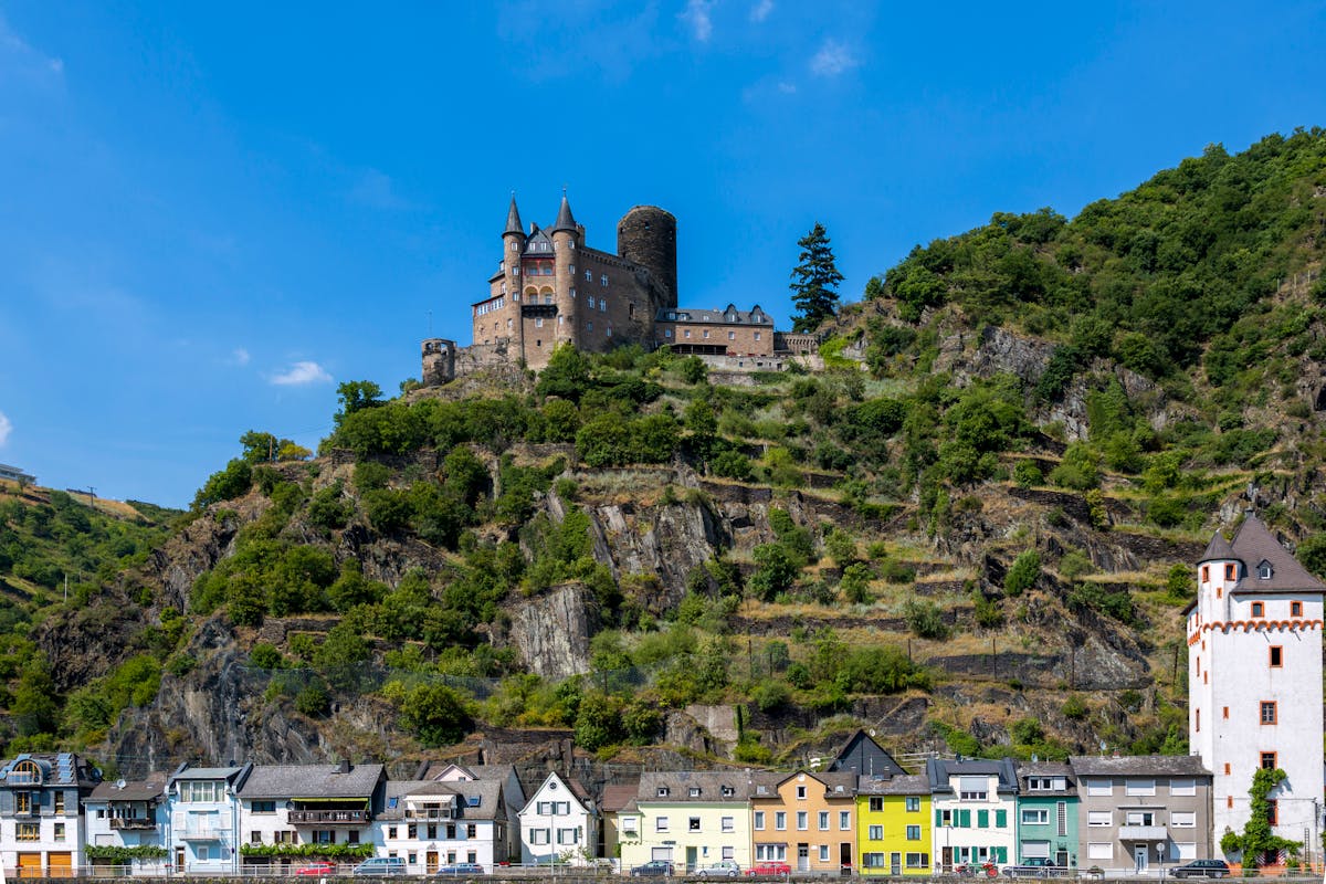Scenic view of Katz Castle perched on a hill above colorful buildings in Sankt Goarshausen Germany