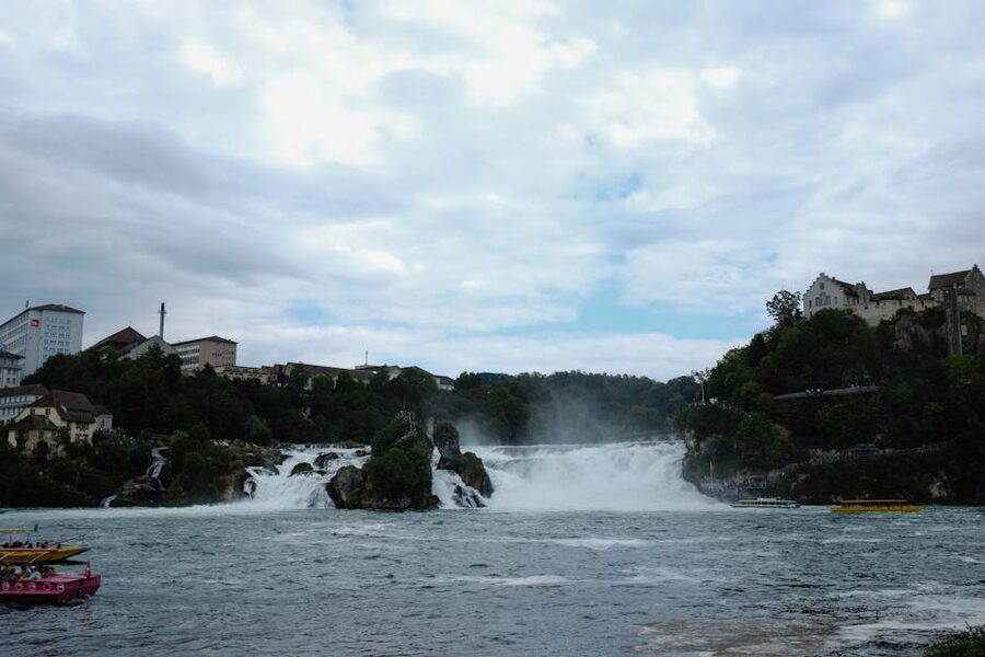 Rhine Falls with colorful tour boats