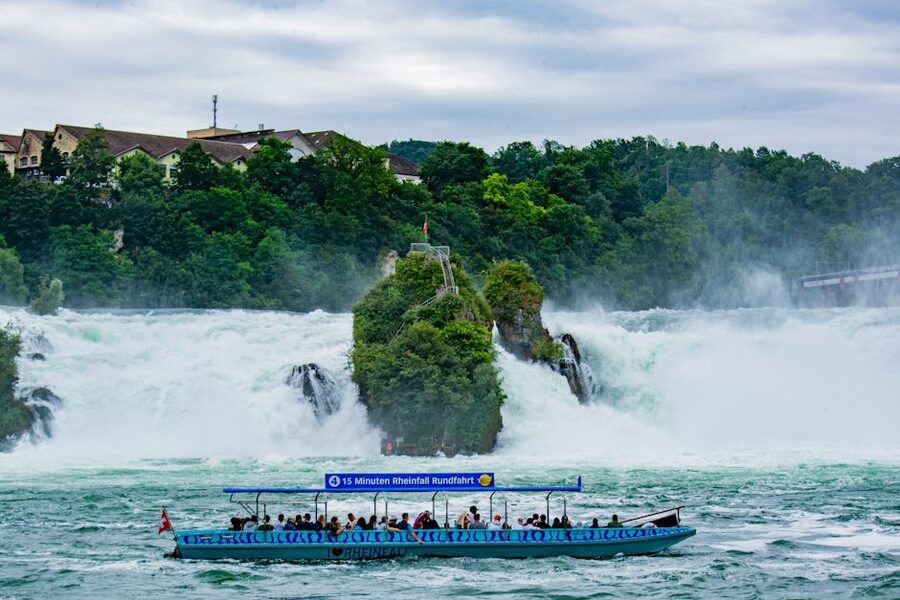 Tourists on boat below Rhine Falls