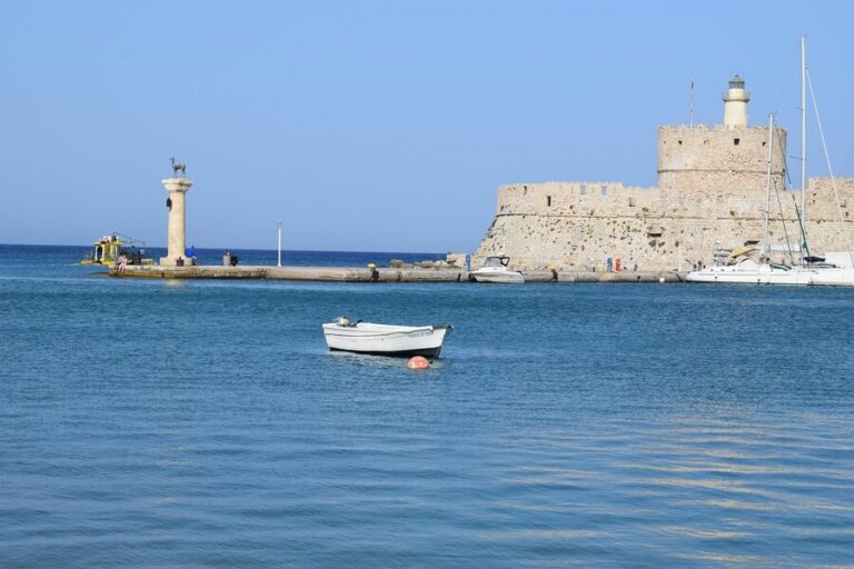 Fishing boats and yachts moored in the harbour of Rhodes, Greece