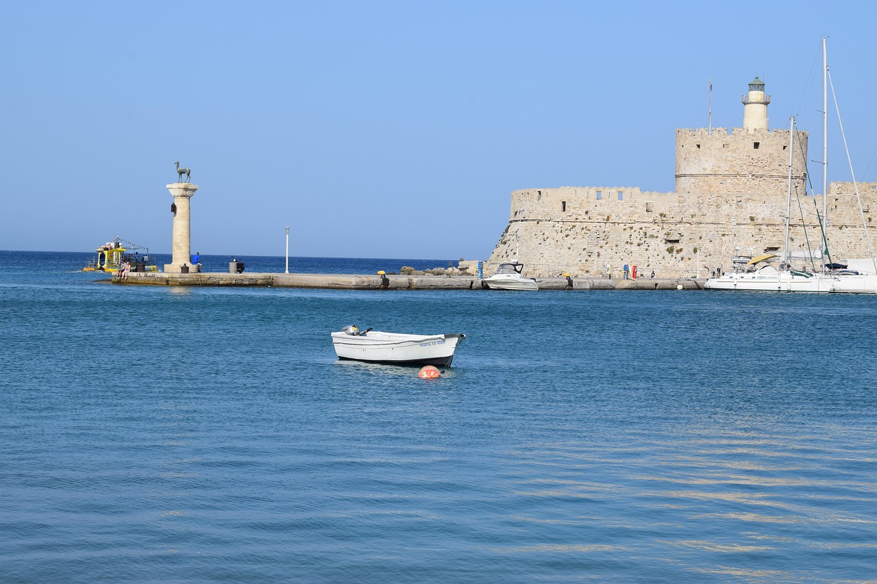Fishing boats and yachts moored in the harbour of Rhodes, Greece