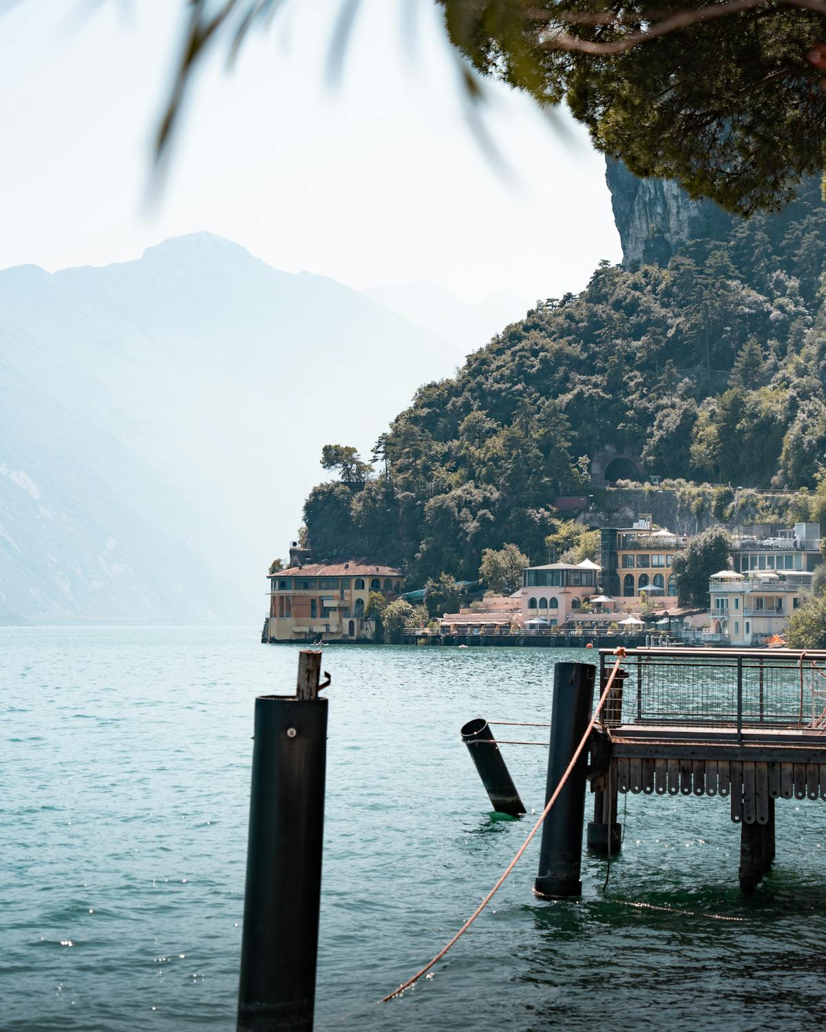 Lakeside architecture in Riva del Garda with mountains and serene lake