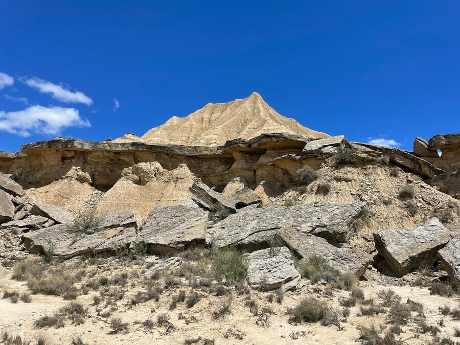 Rocky desert formations under clear blue sky in Spain
