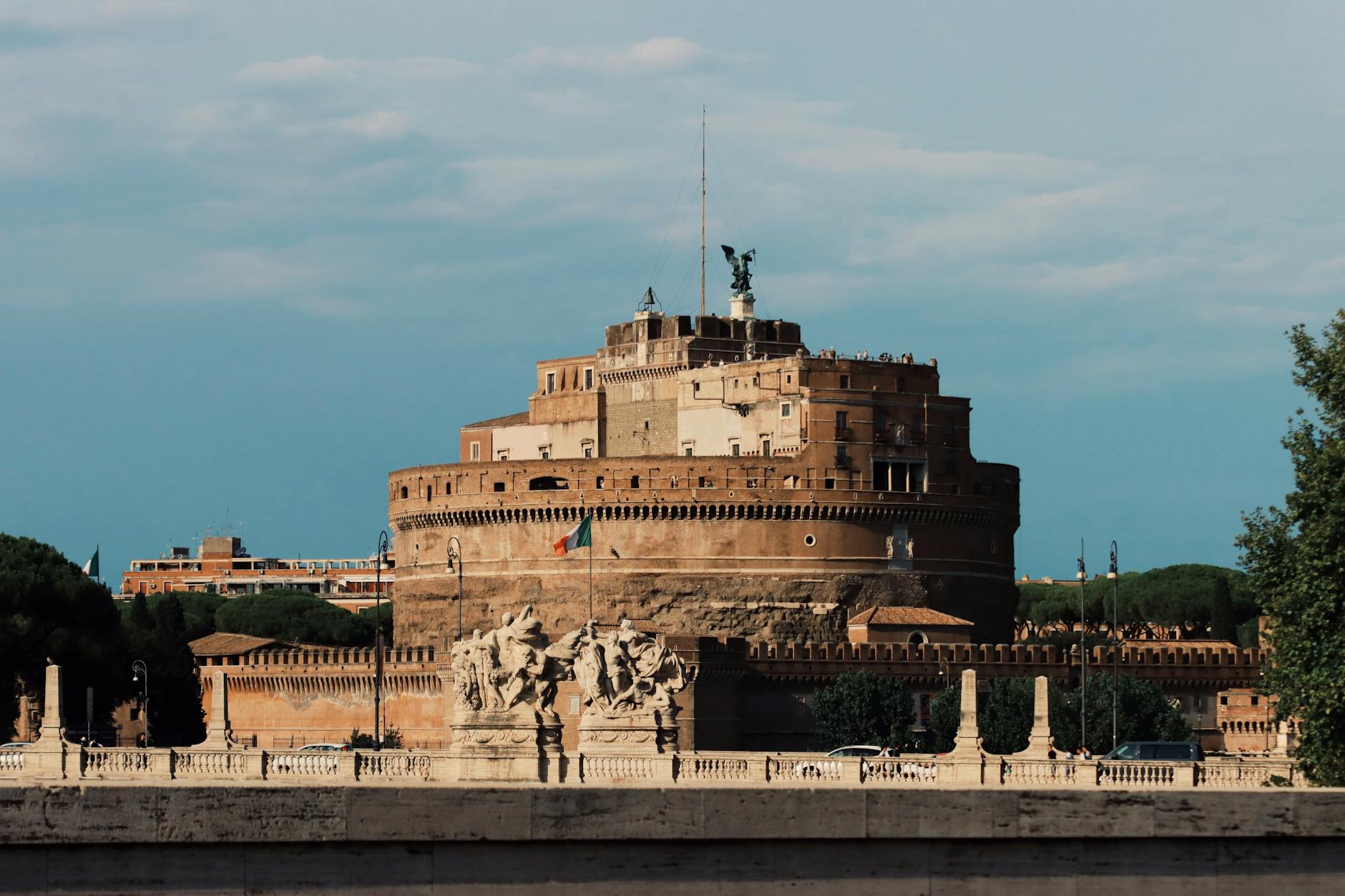 Castel Sant Angelo in Rome with statues and blue sky