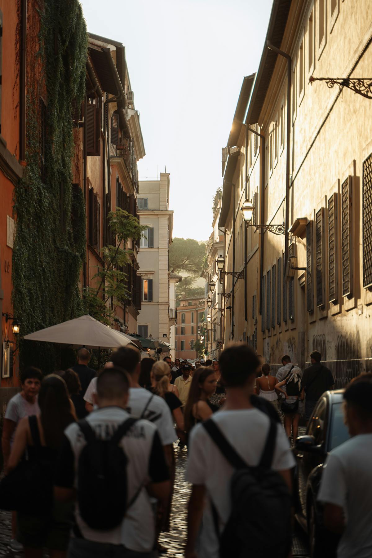 Evening atmosphere in a Rome alley with restaurants