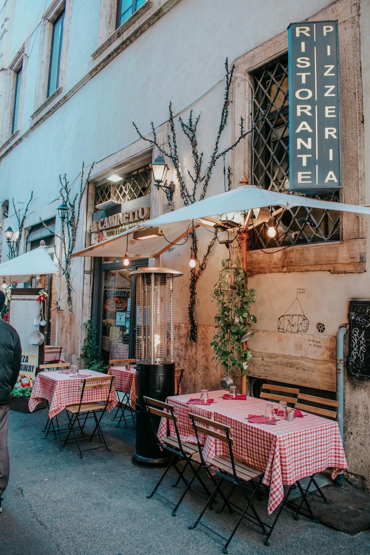 Cozy Italian cafe with outdoor seating in Rome