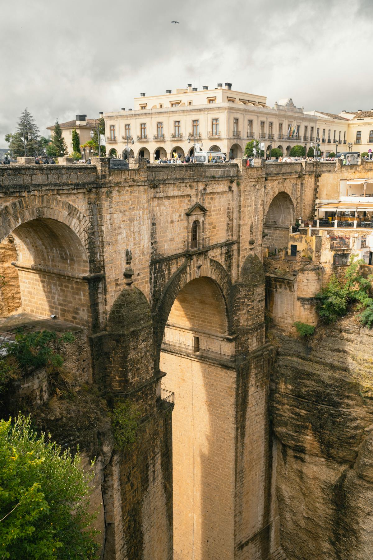 The Puente Nuevo bridge spanning the deep El Tajo gorge in Ronda Spain with sheer cliff walls dropping away on both sides