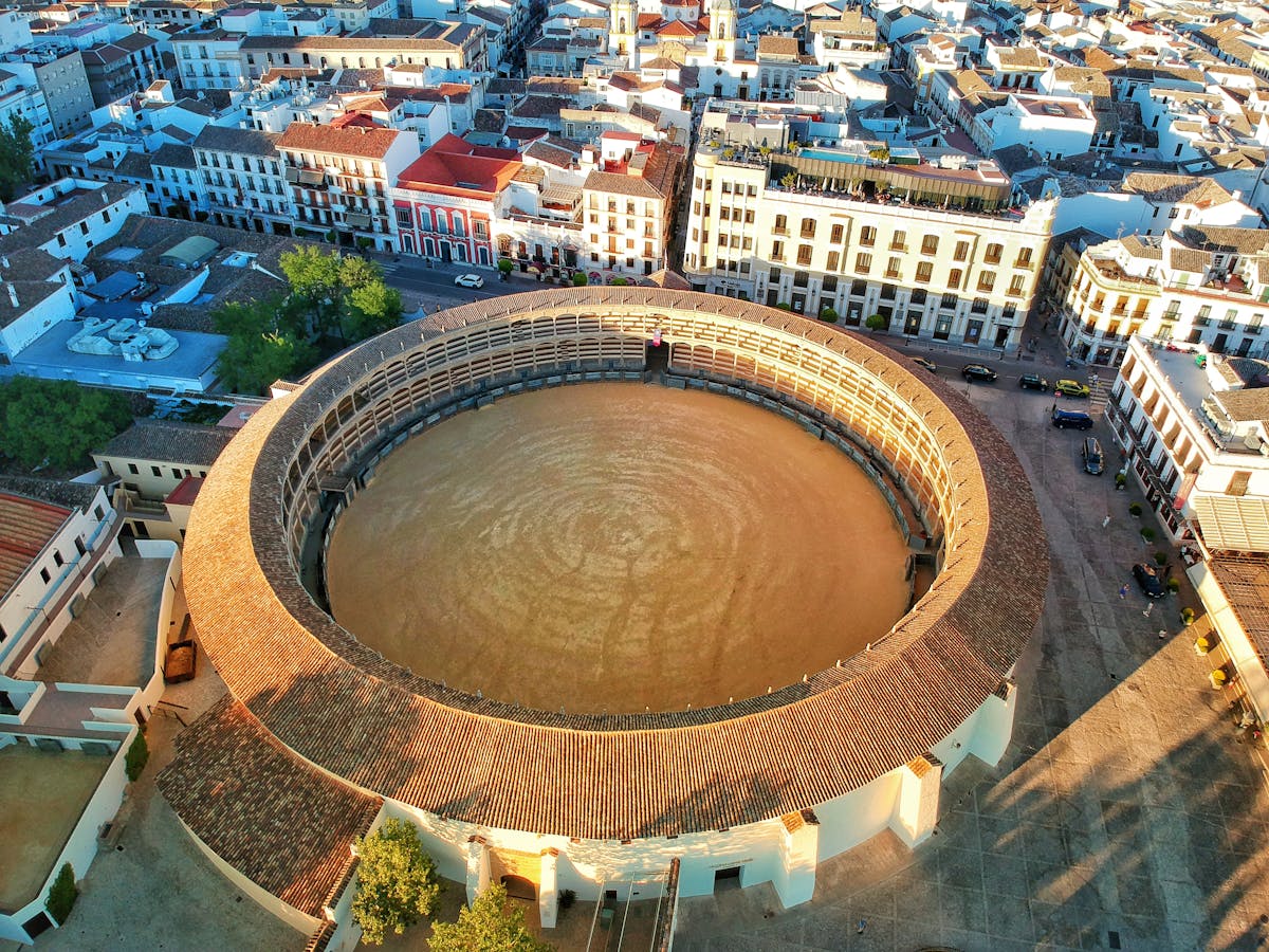 Aerial view of the Plaza de Toros de Ronda bullring surrounded by the historic town buildings