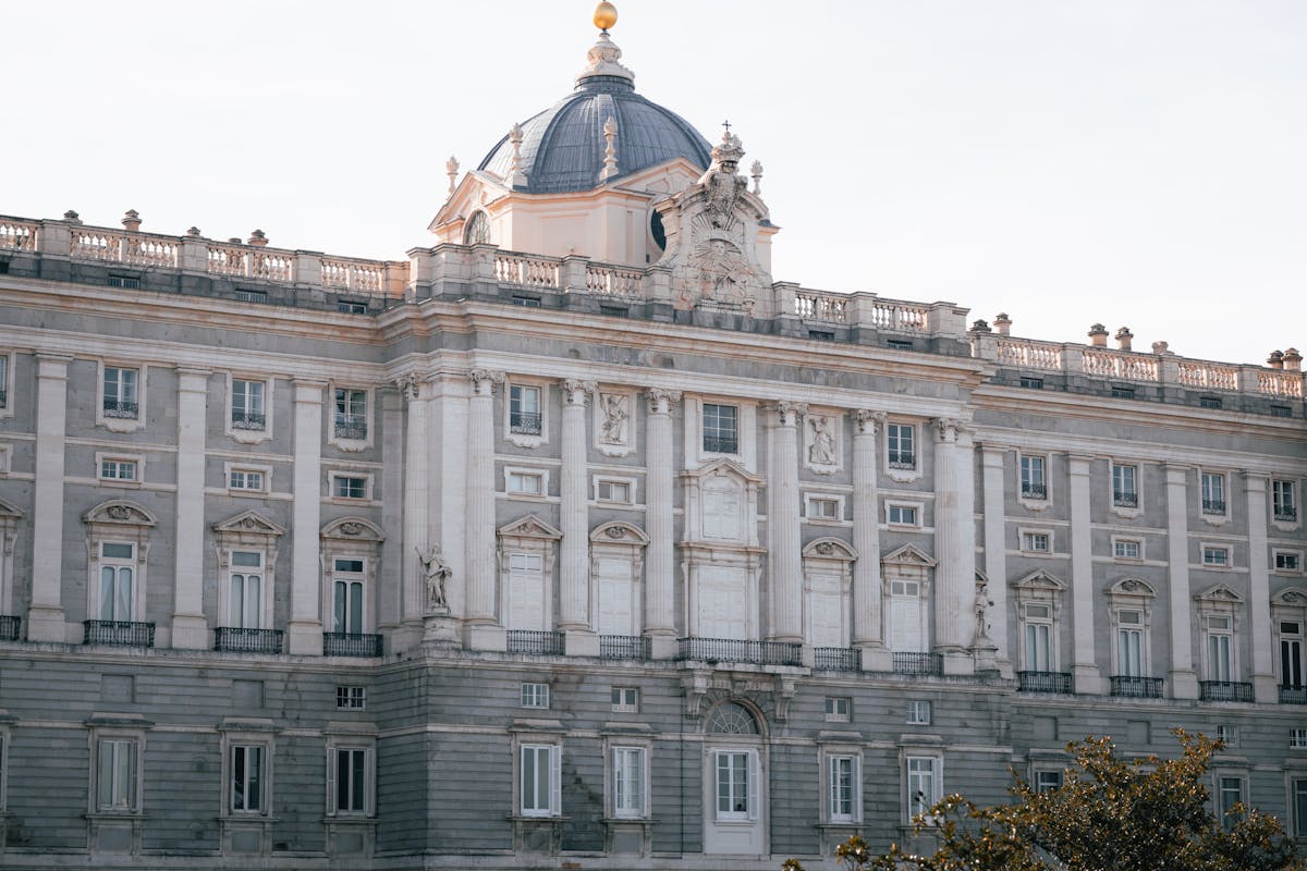 Close-up architectural detail of the Royal Palace of Madrid facade