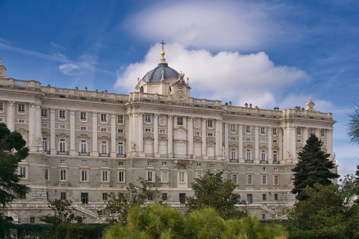 The grand exterior of the Royal Palace of Madrid showcasing its imposing architecture