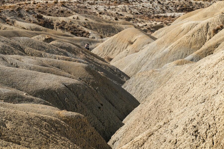 Rugged desert terrain under bright Spanish sunlight