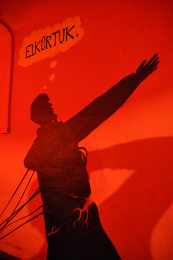 Red Ruin Bar Budapest exterior with communist-era poster style