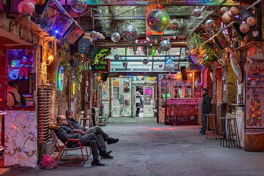 Szimpla Kert interior with eclectic decorations and warm lighting Budapest