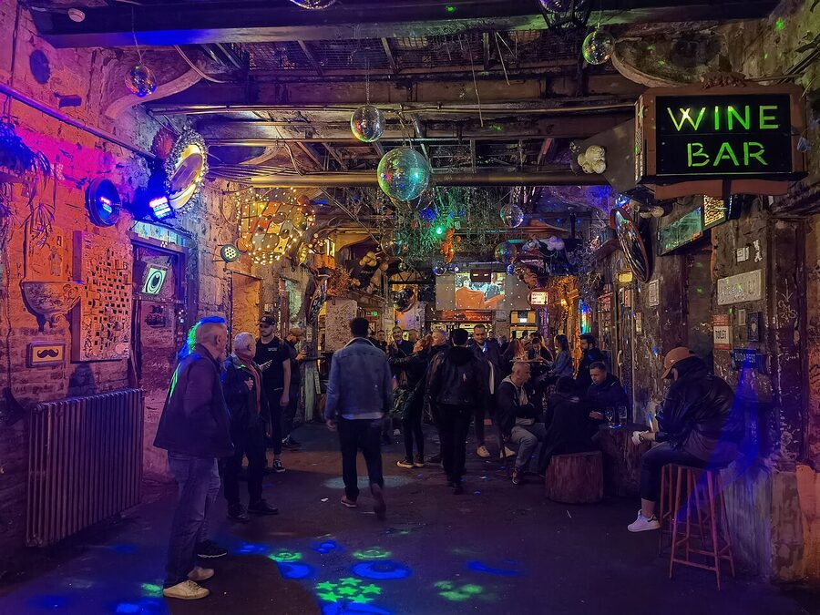 Szimpla Kert seating area with old furniture and warm lighting Budapest