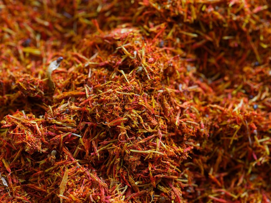 Close-up of saffron threads showing the spice rich color and texture