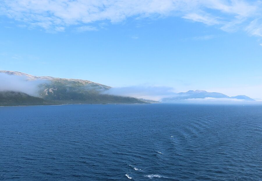 View from boat deck of Tromso fjord with mountains