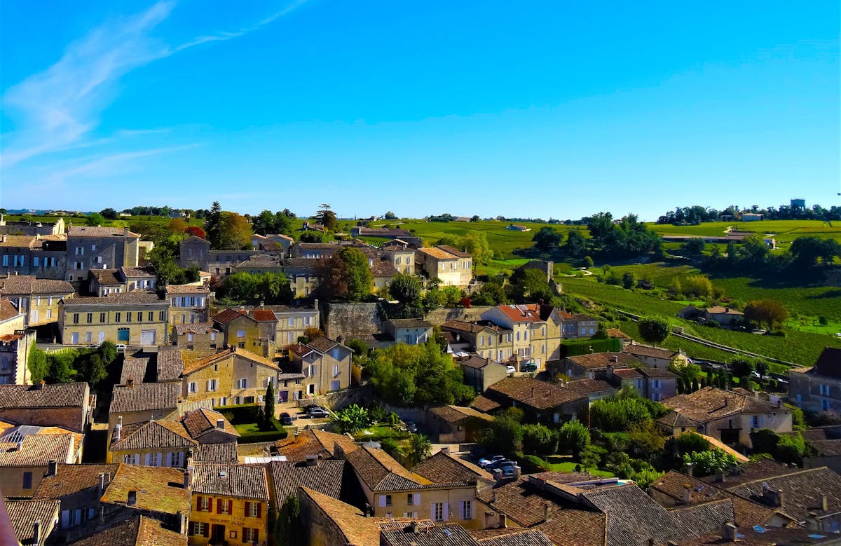 Aerial view of Saint-Emilion village surrounded by vineyards in Bordeaux wine region