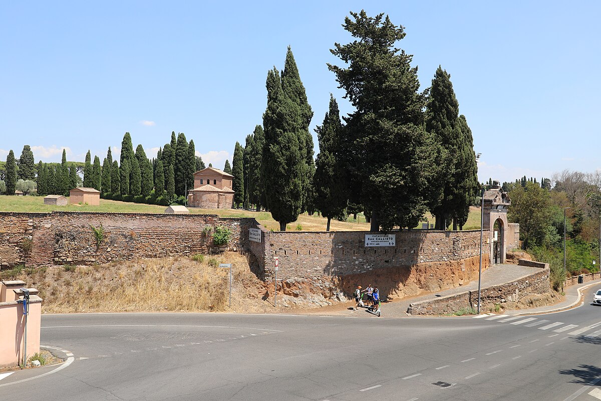 Green park-like grounds of the Catacombs of San Callisto in Rome