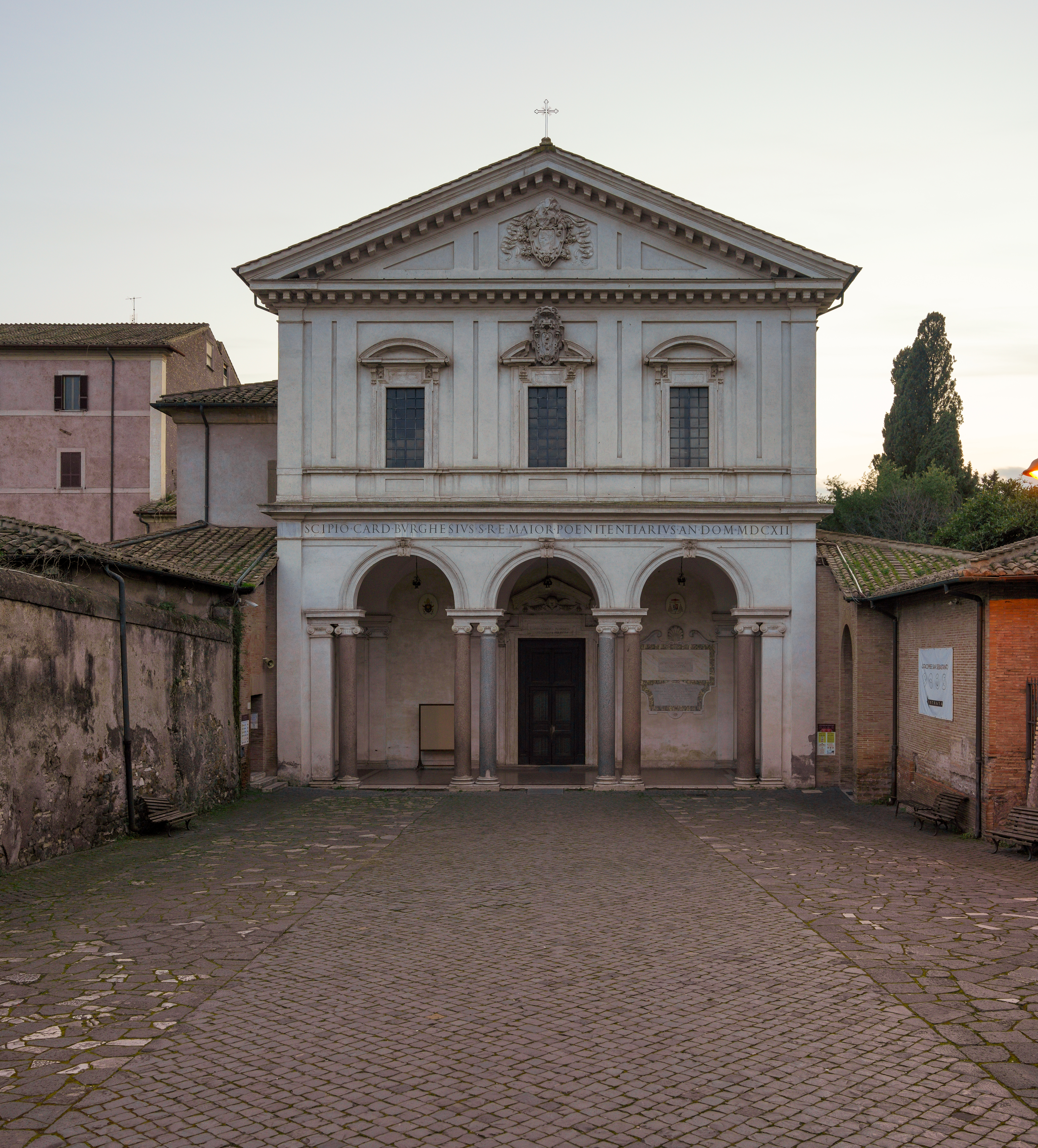 The white facade of Basilica San Sebastiano fuori le Mura on the Appian Way in Rome