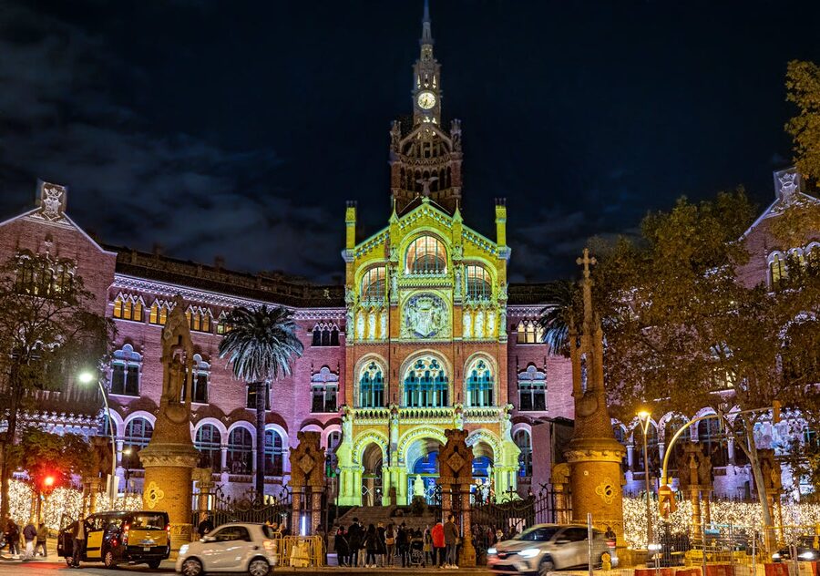 Sant Pau Recinte Modernista lit up at night showing Art Nouveau pavilions