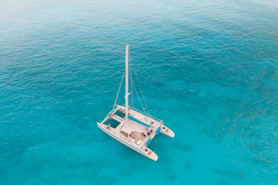 Catamaran turquoise water aerial