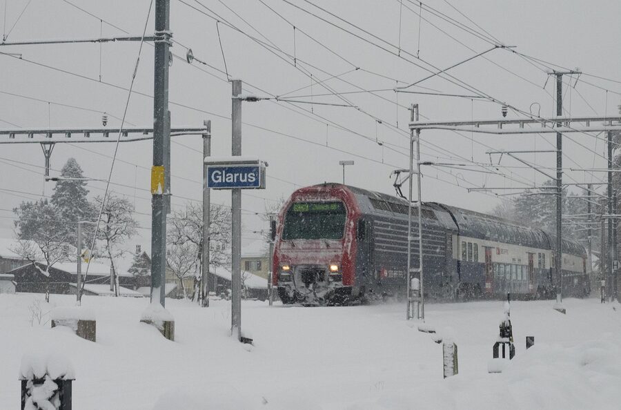 SBB train winter snow Glarus Switzerland