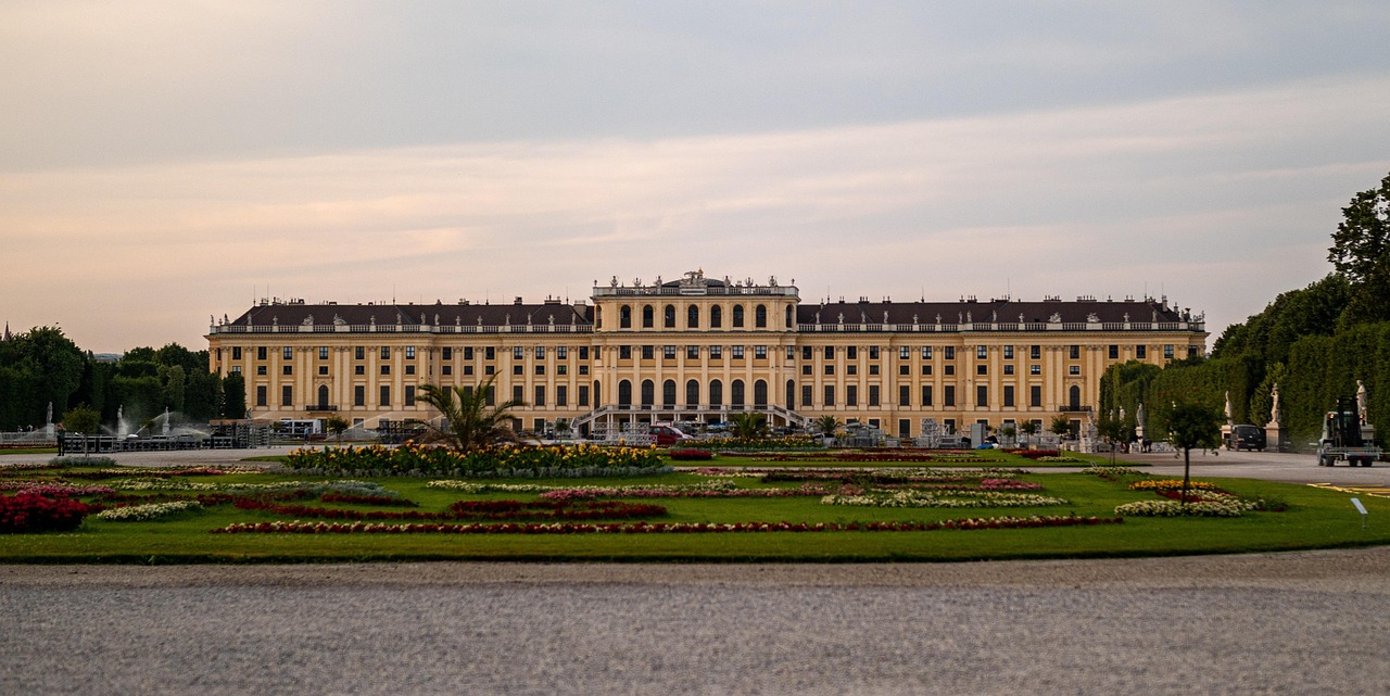 Schonbrunn Palace facade glowing in warm sunset light