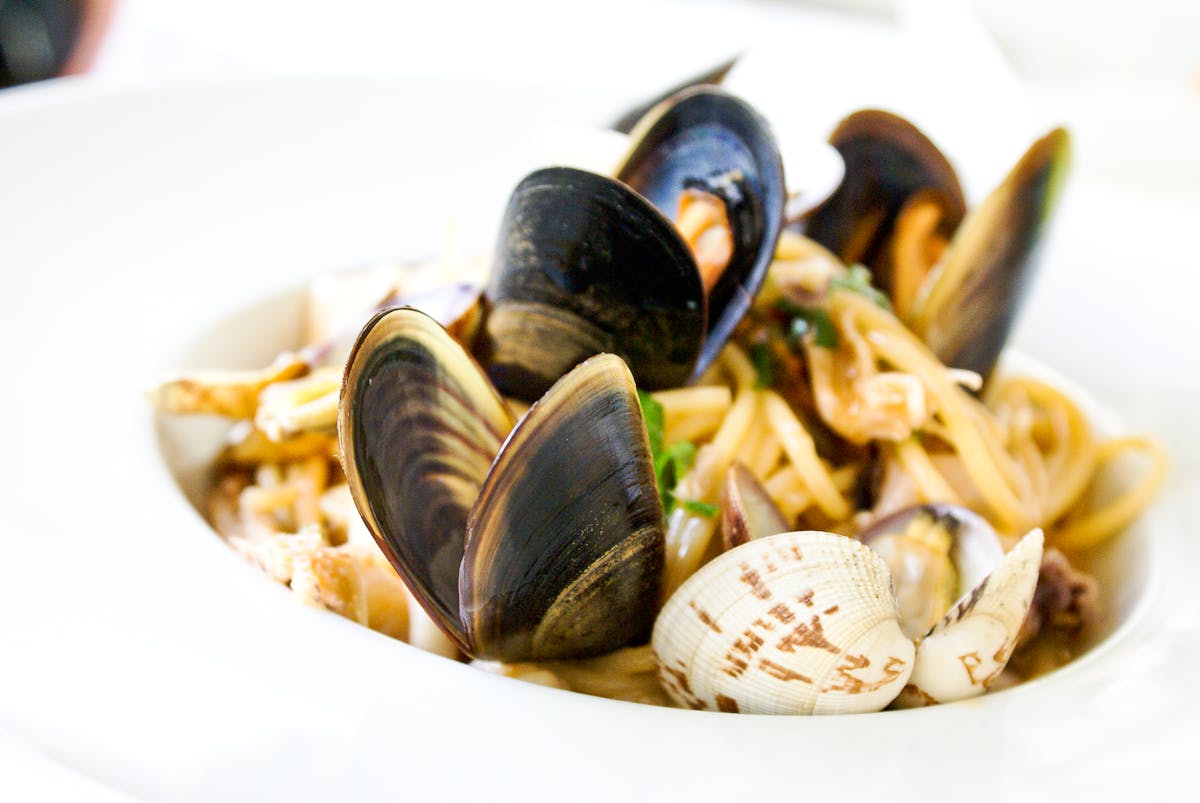 Close-up of Italian seafood pasta with clams and mussels