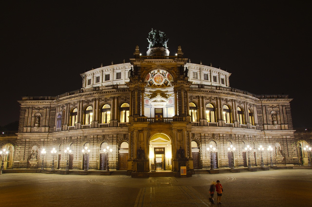 The Semperoper opera house dramatically lit at night in Dresden
