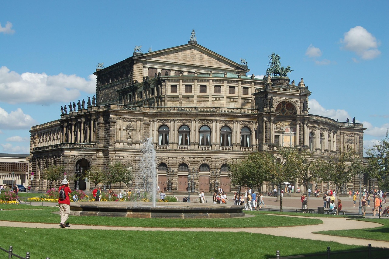 The Semperoper opera house in Dresden with a dramatic sky behind it