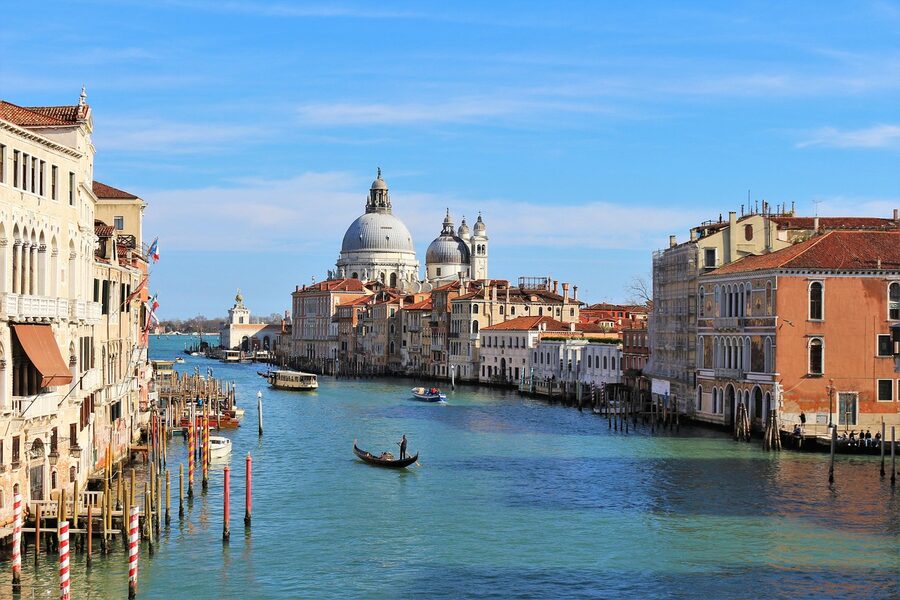 Grand Canal in Venice with view of basilica and gondola boats