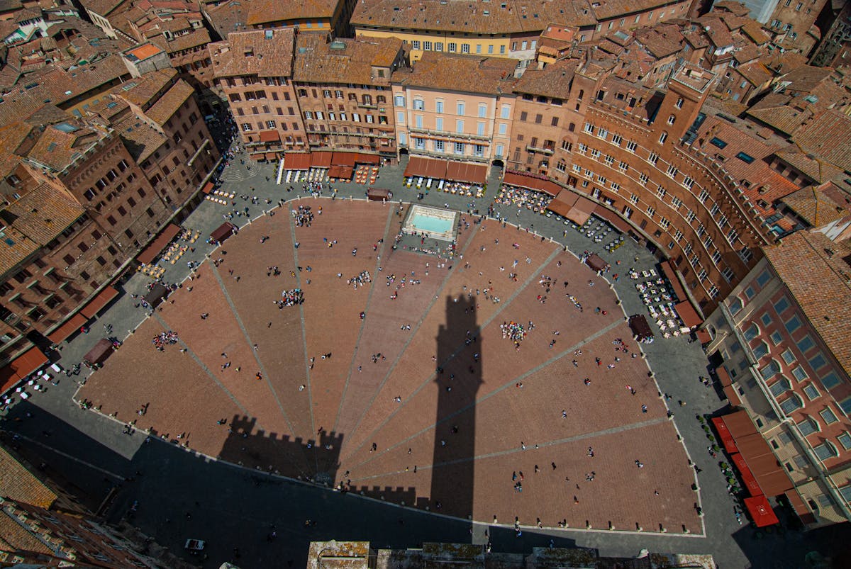 The distinctive black and white striped marble facade of Siena Cathedral